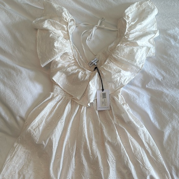 White eyelet V-Neck ruffle mini, smocked waist by “WeWoreWhat”. New w/tags - Picture 1 of 6